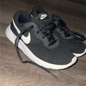 Boys Nikes size 12c. Used but kept up with.
